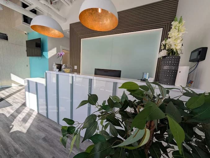 Front reception and waiting area at Rundlehorn Smiles Dental in NE Calgary